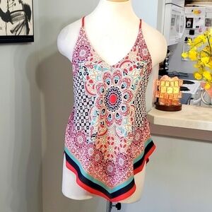 Heartsoul, summer top. Size medium. Rust, blue, tan and black. Hi/low hem.